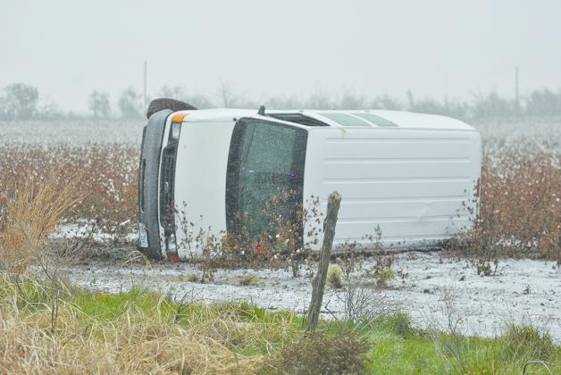 The driver of this van was able to walk away after the vehicle rolled over on Hwy. 208 today. The cause of the accident was not determined, but roads were slick in the area. The driver was transported to Cogdell Memorial Hospital by Scurry County EMS.